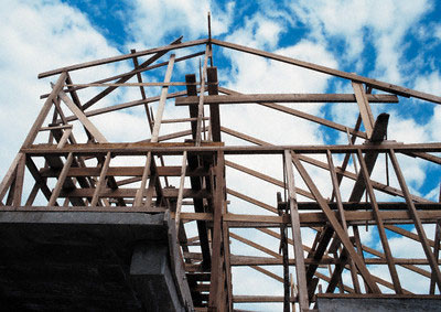 Looking up at an unfinished house
