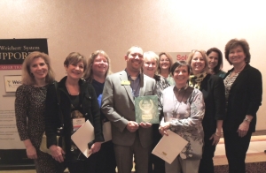 Broker/Owner John Lawrence and members of the sales team with the 2014 Model Office Award.