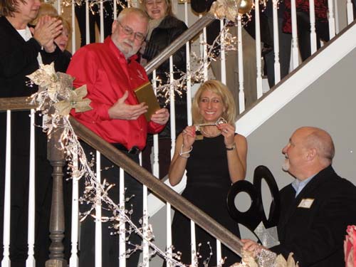 William-McCloud-red-shirt-Nicolle-Gardiner-cutting-ribbon-and-Jim-Norris.jpg