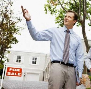 Real estate agent showing couple a home