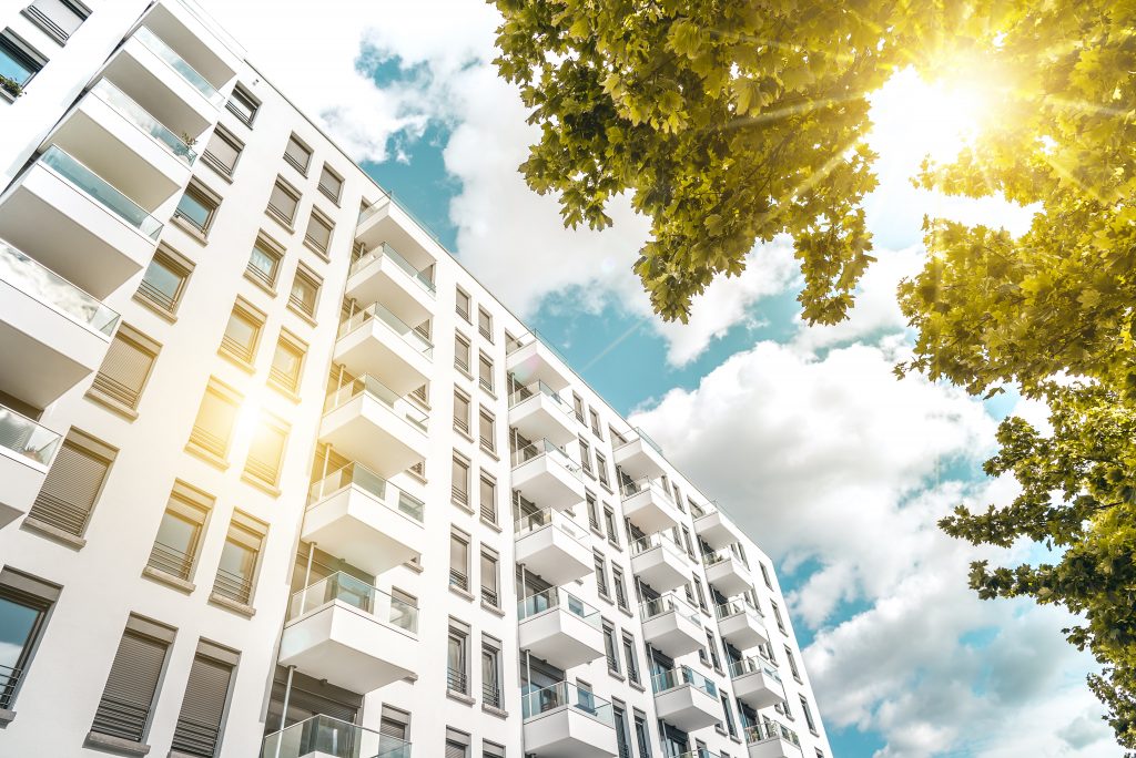 sunny modern cubic white residential houses in berlin
