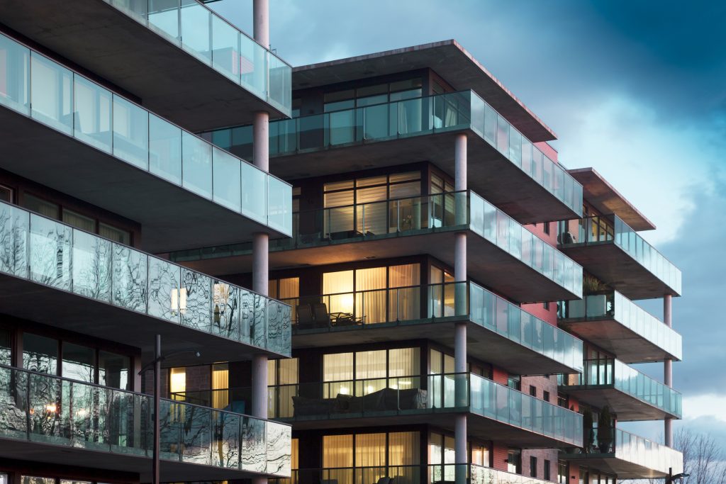 Balconies of a modern luxury apartments with a blue sky