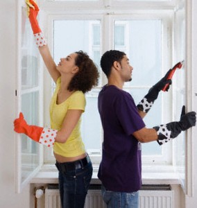 Couple Sanding and Cleaning Windows