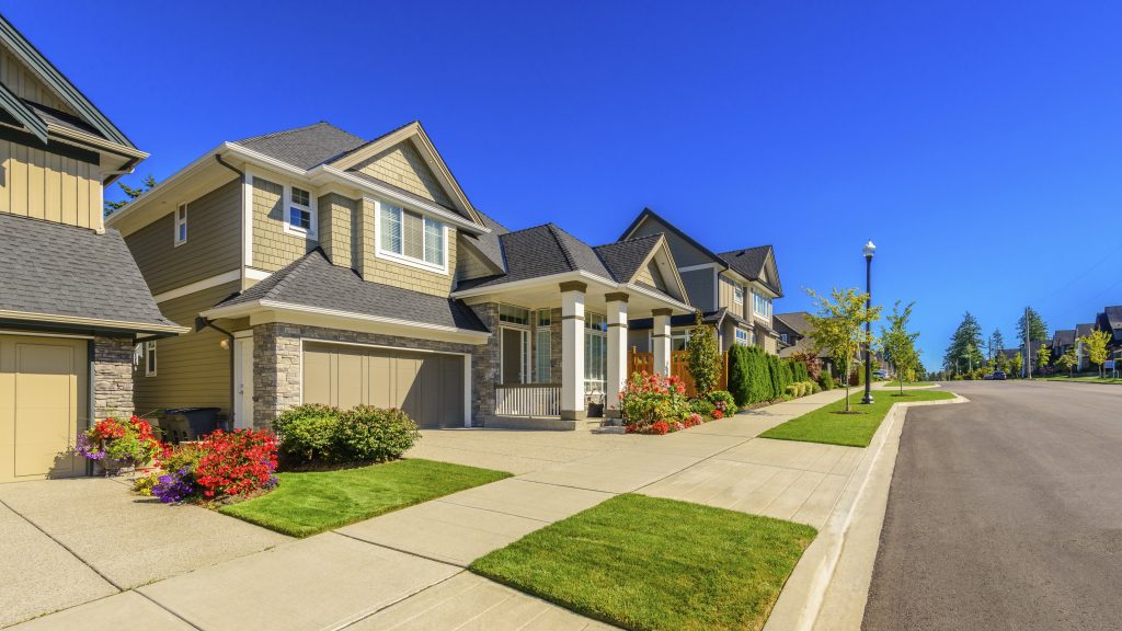A perfect neighborhood. Houses in suburb at Spring in the north America.
