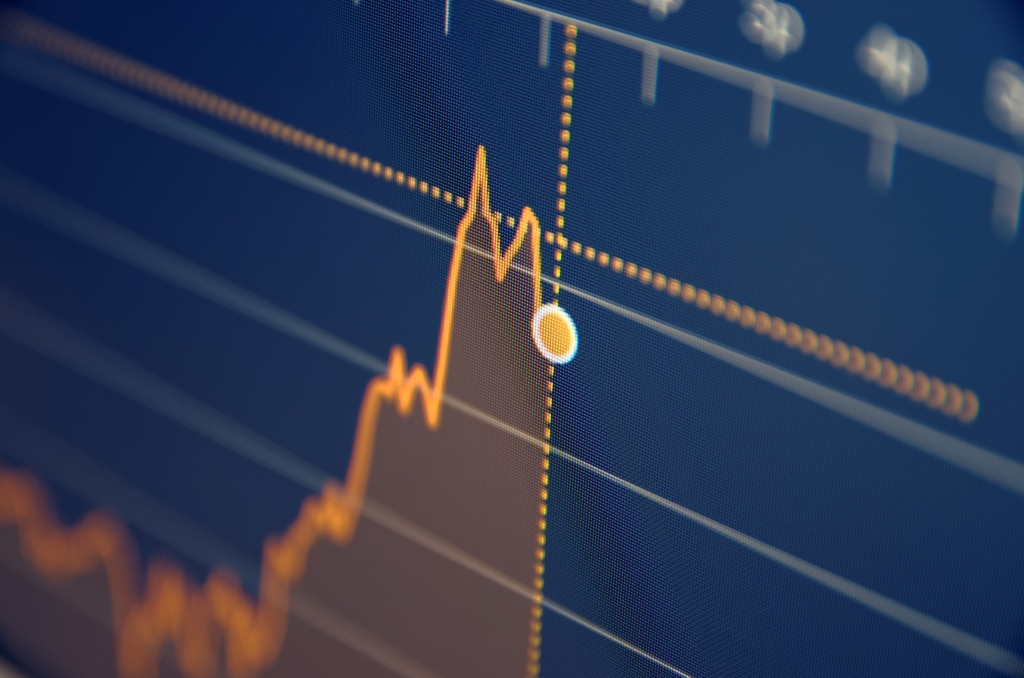 Stock market chart on LCD screen. Selective focus.